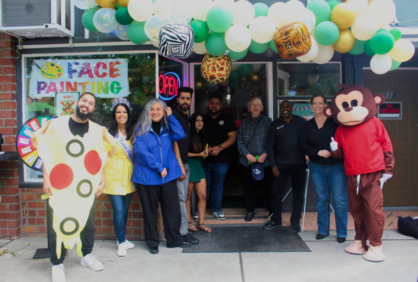 <p>The Renton Chamber of Commerce and Renton City Council members celebrate Smoking Monkey Pizza’s 10-year celebration. Photo by Bailey Jo Josie/Alb Media.</p>